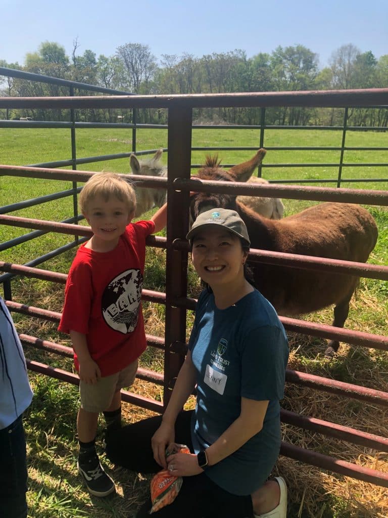 Jenny Zhang with a student (her next-door neighbor's son!) during a Field Study school trip at The Land Trust for Tennessee's Glen Leven Farm. 